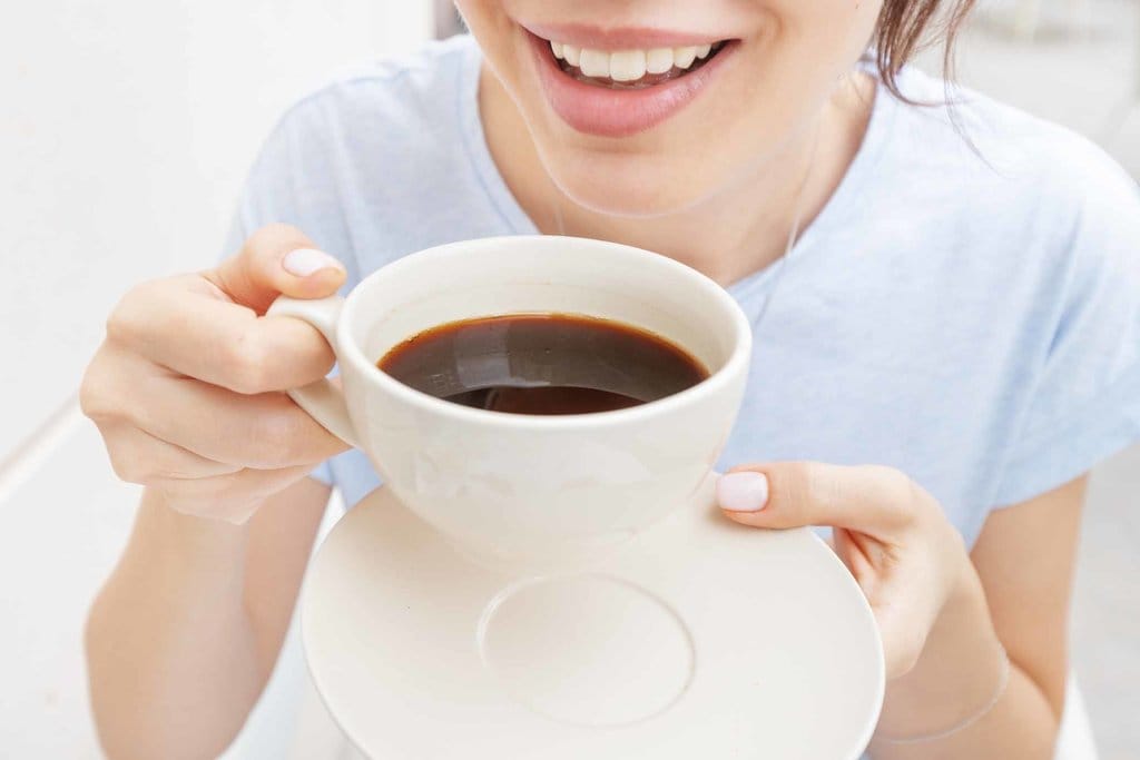 Ilustrasi Minum Kopi Hitam. foto/IStockphoto Ilustrasi Minum Kopi Hitam