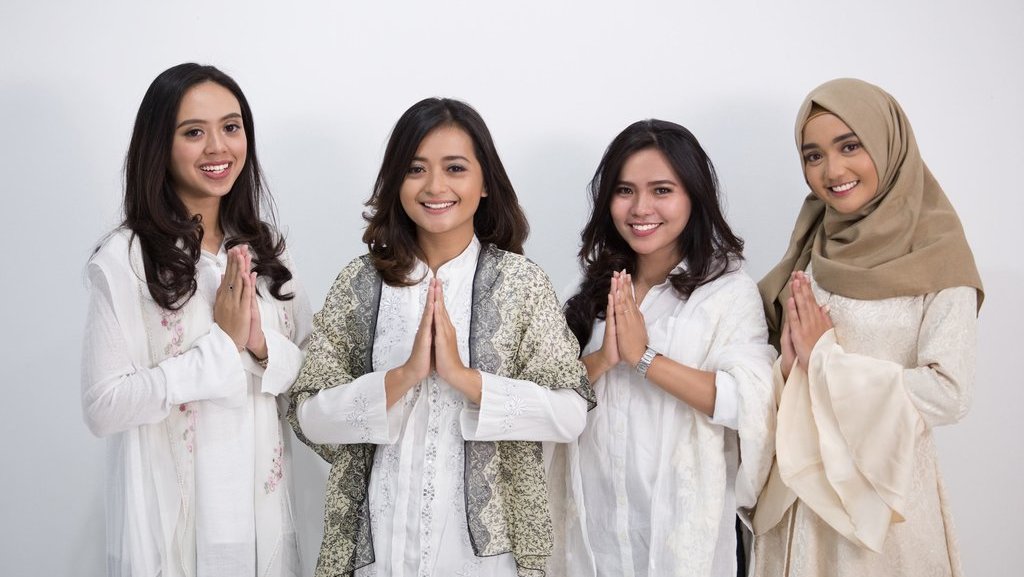 Ilustrasi Baju Lebaran. FOTO/iStockphoto Baju Nuansa Putih