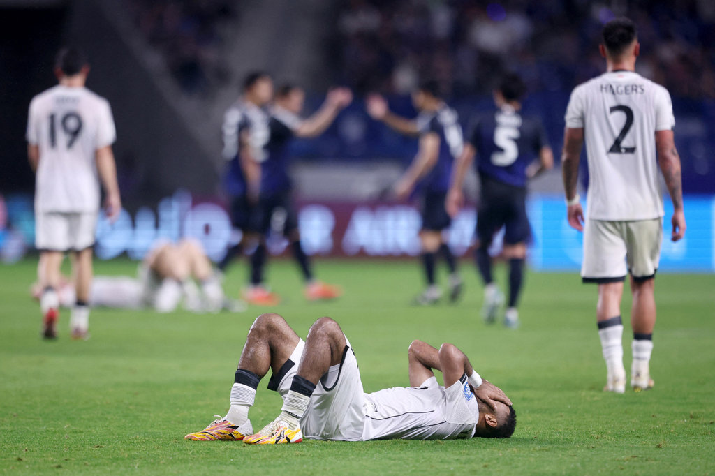 Timnas Indonesia kalah 6-0 di markas Jepang. (Photo by PAUL MILLER / AFP) Timnas Jepang vs Indonesia