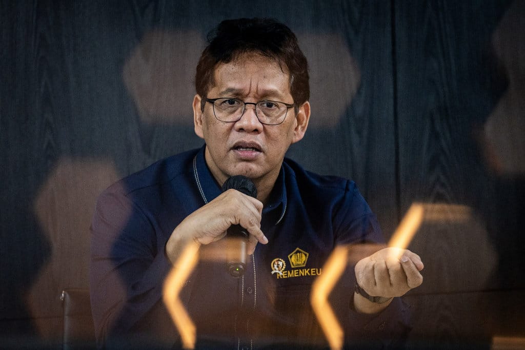 Menteri Keuangan Purbaya Yudhi Sadewa menjawab pertanyaan wartawan saat media briefing di Kantor Kementerian Keuangan, Jakarta, Rabu (31/12/2025). Menteri Keuangan menyatakan optimis ekonomi nasional bisa tumbuh enam persen yang didukung dari Bank Indonesia dalam mendorong perekonomian nasional pada 2026. ANTARA FOTO/Bayu Pratama S/tom. Menteri keuangan optimis ekonomi nasional tumbuh enam persen