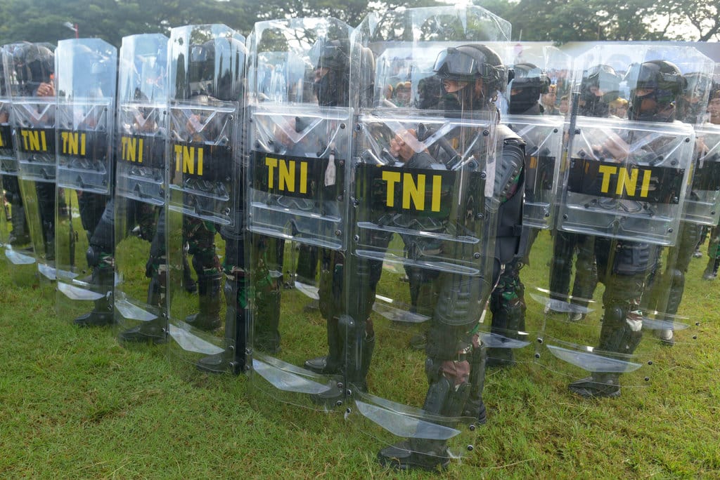 Lingkaran Hitam Kekerasan Militer Kapan Usai