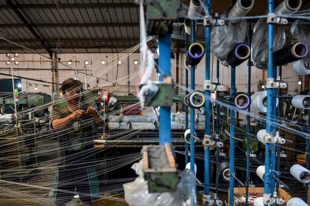 Jalan Tengah Pembenahan Industri Tekstil