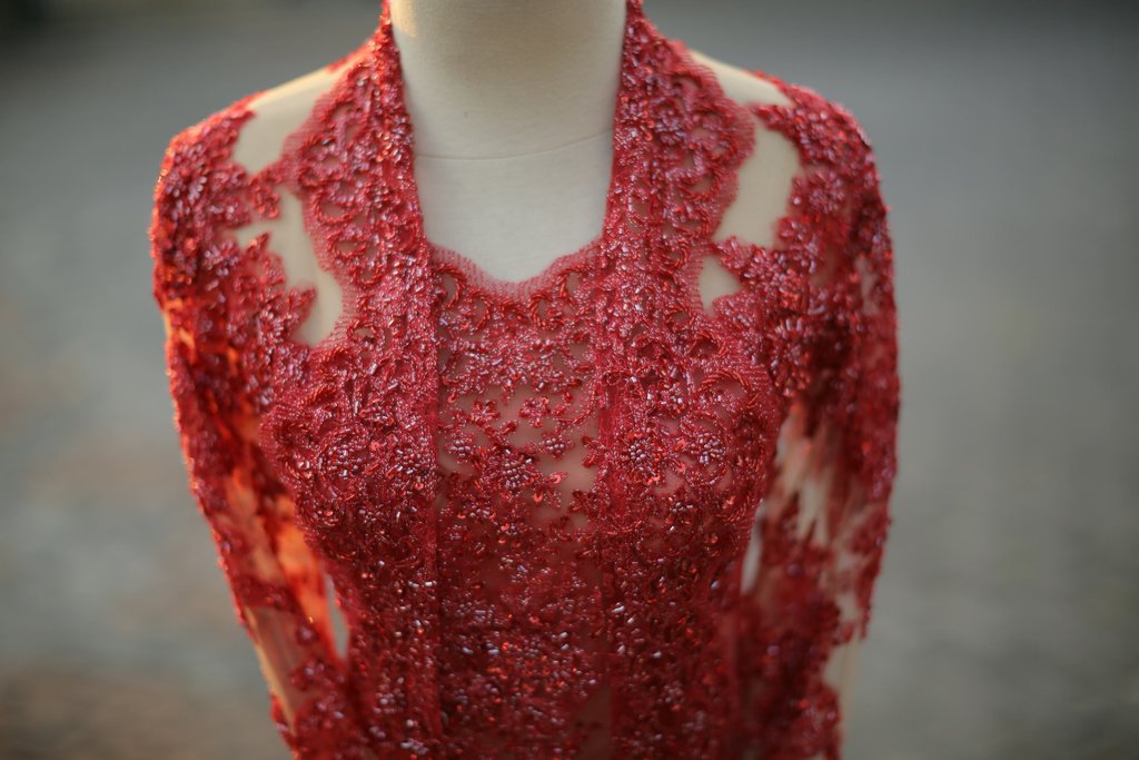 Baju Kebaya Merah. FOTO/iStockphoto Baju Kebaya Merah