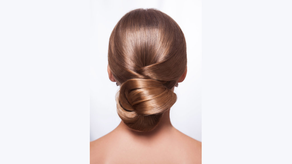 Rambut Low Chignon. foto/istockphoto Rambut Low Chignon