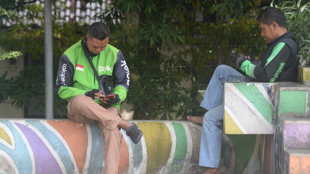 Rencana Kenaikan Tarif Pertaruhkan Kesejahteraan Pengemudi Ojol Rencana Kenaikan Tarif Pertaruhkan Kesejahteraan Pengemudi Ojol