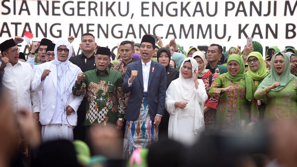 Hari Lahir Muslimat NU, Jemaah Sambut Jokowi dengan Selawat Badar Hari Lahir Muslimat NU, Jemaah Sambut Jokowi dengan Selawat Badar