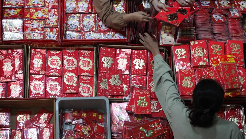 Gemerincing Uang dan Miliaran Perjalanan di Momen Perayaan Imlek Gemerincing Uang dan Miliaran Perjalanan di Momen Perayaan Imlek