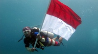 WASI Pecahkan Rekor Dunia Pembentangan Bendera Bawah Air Terbesar