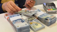 Rupiah Menguat 14 Poin Terhadap Dolar AS pada 1 Juli