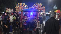 Mereka yang Mengais Rezeki Saat Malam Tahun Baru di Jakarta