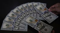 Rupiah Kembali Sentuh Rp14.000 Per Dolar AS pada 26 Juli