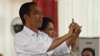 Jokowi dan Iriana Selesai Mencoblos di TPS 008 Gambir