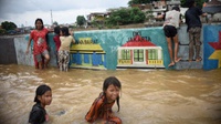 Usai Banjir, Pemkot Jaktim Turunkan Alat Berat di Kampung Pulo
