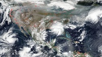 NASA Rilis Foto Empat Badai dan Asap Kebakaran yang Mengancam AS