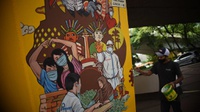 Mural Lawan Covid-19 Menghiasi Kolong Tol Tomang