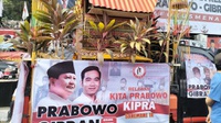 Sukarelawan Prabowo-Gibran Bawa Pikap Beraksesori Adat Toraja