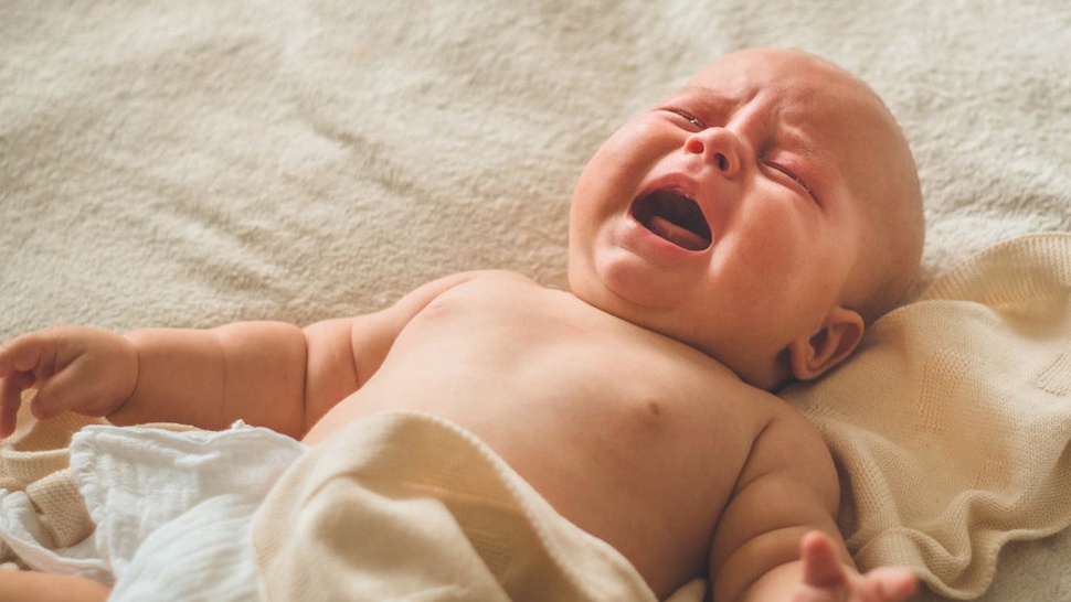 Obat Alami Infeksi Telinga Bayi: Kompres dengan Air Hangat